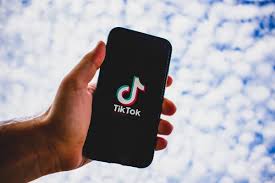 biblioteca de anúncios do tiktok dms Assistente Criativo